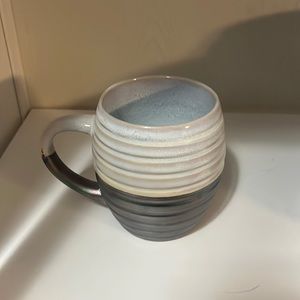 White and marble coffee cup. Used a handful of times